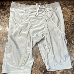 Men’s TAG football compression shorts to hold the protective pads size large